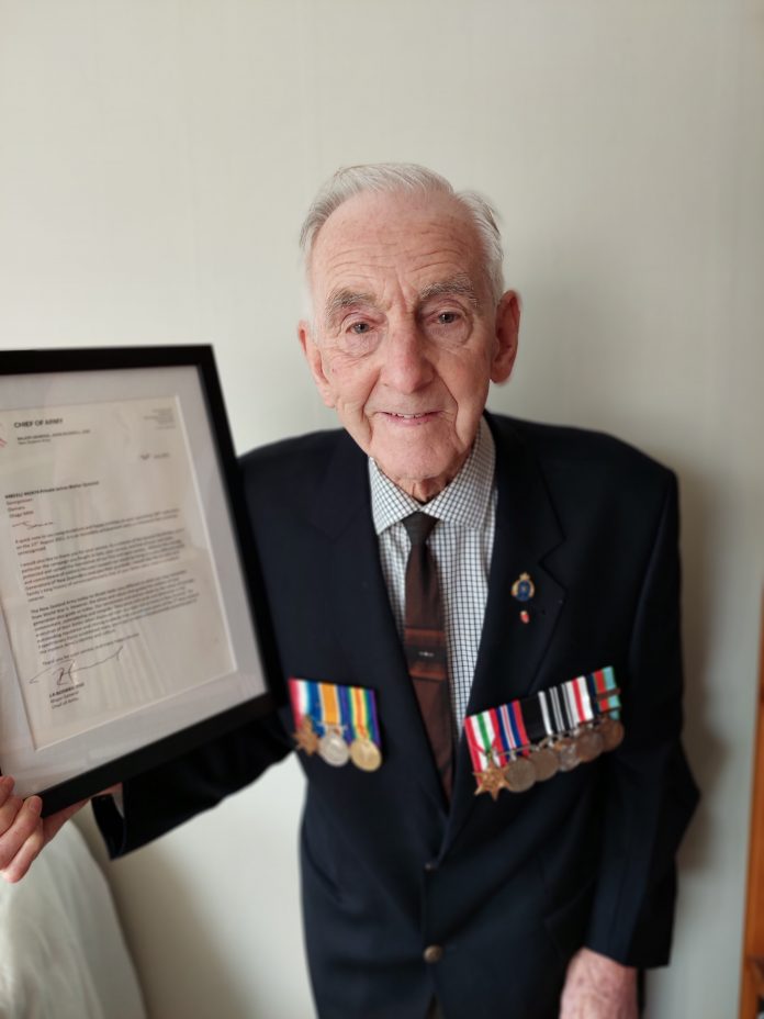 Dad with letter from army on 100th birthday